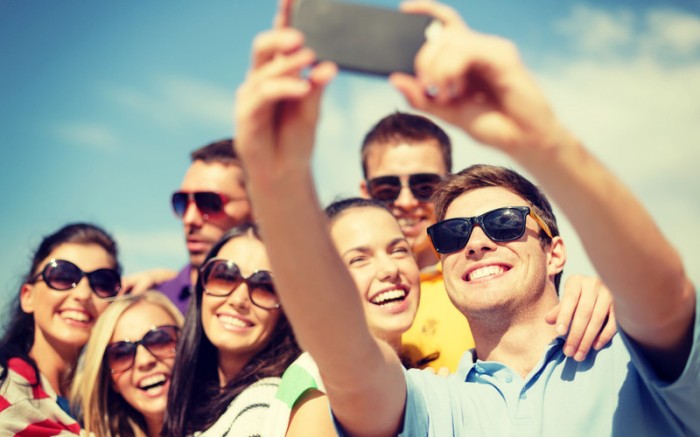 Group-of-smiling-people-taking-a-selfie-800x500.jpg